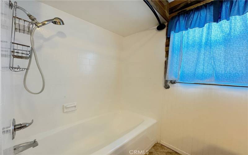 Shower/Tub Combo In Guest Bathroom