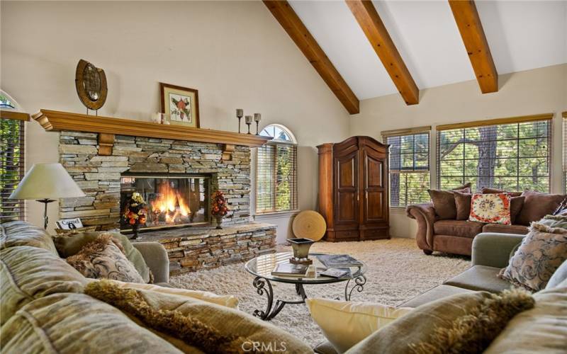 Living Room with high Beamed Ceiling and another beautiful Fireplace