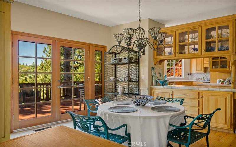 View into Dining Room/Kitchen from Living Room, wonderful view from deck deck