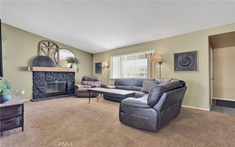 Living room, check out the fire place.