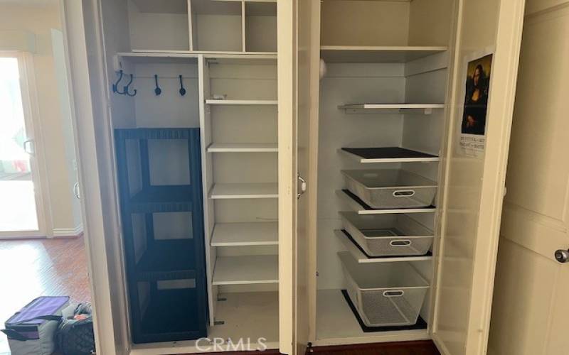 Built in storage in the entry closet.