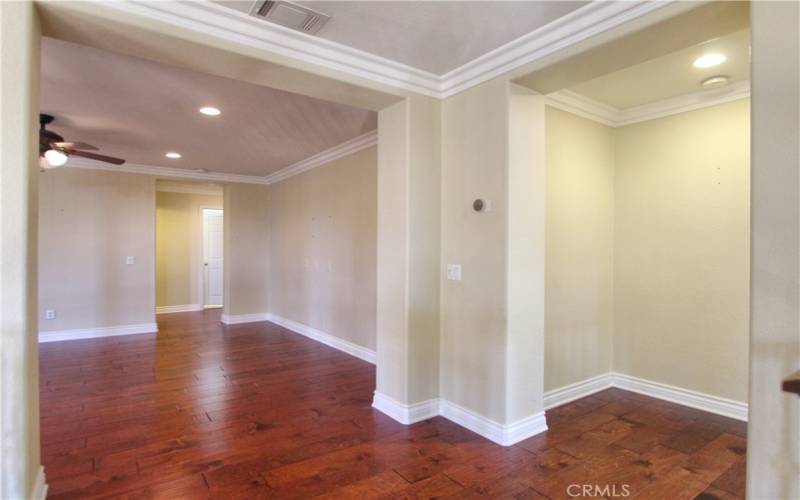 Landing leading into bonus room and primary bedroom suite (right).