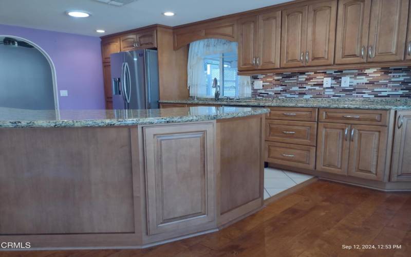 Granite Counter Leading to Dining Room