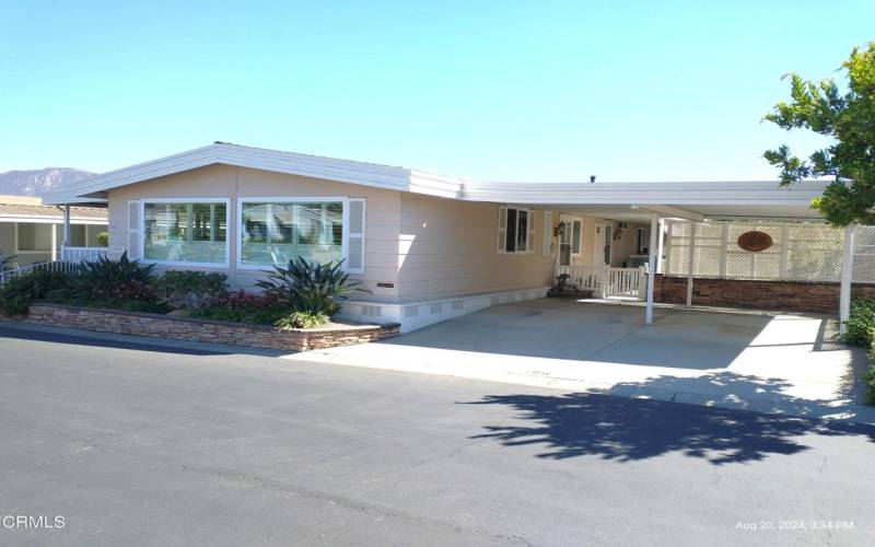 Front of Home with Side-By-Side Parking