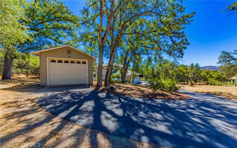 Detached 1 car garage/shop with additional room