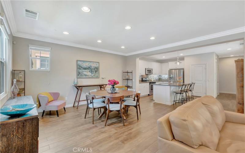 Open concept floor plan w/ walnut grain tile flooring reminiscent of aged hardwood