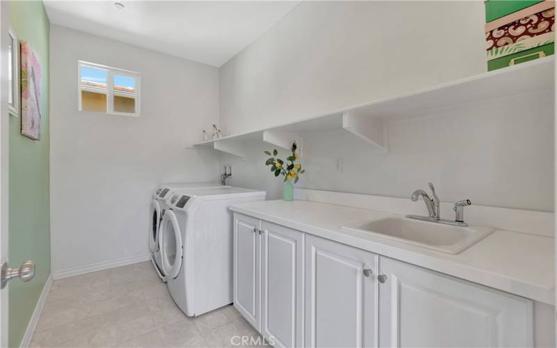 Laundry room with sink