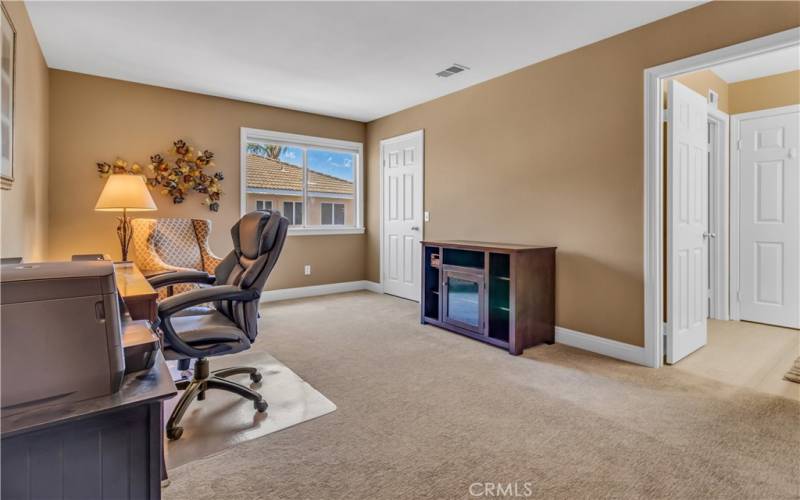 Bedroom with walk in closet