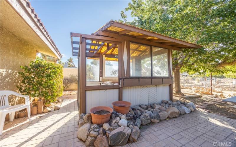 Backyard shade structure, old spa (not functional)