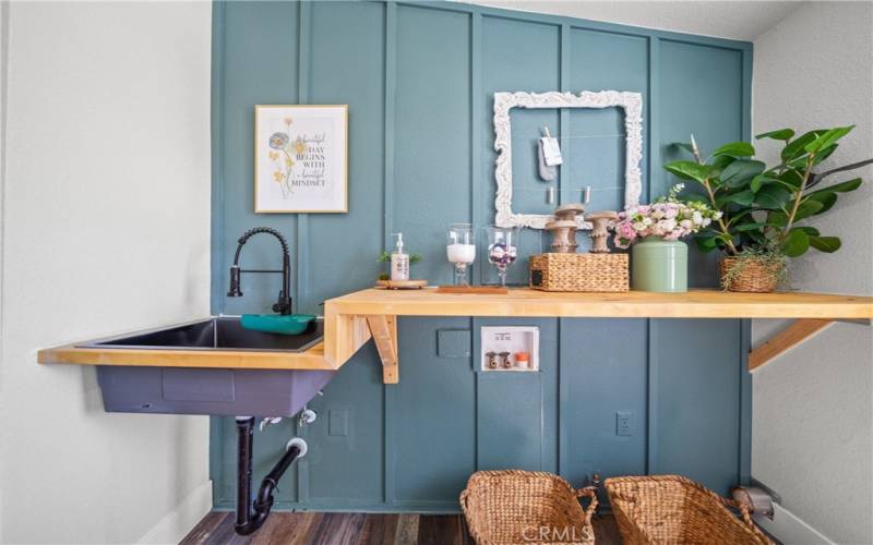 Large Sized Laundry Room with Exit to the Backyard