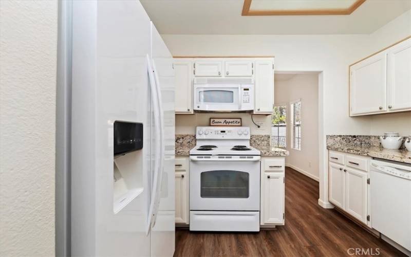 Updated kitchen with granite counter tops.