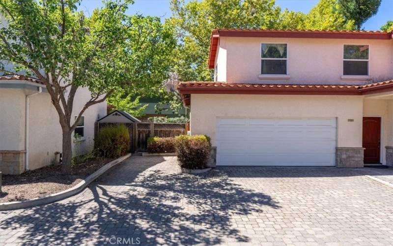 Two car attached garage and additional parking area