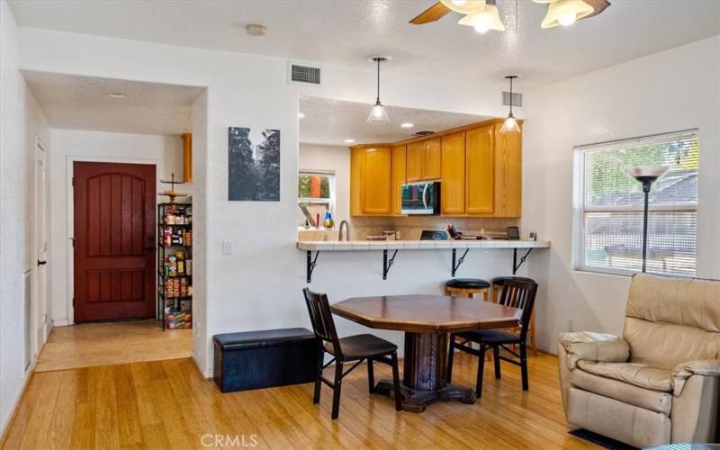 Living area open to kitchen with bar area