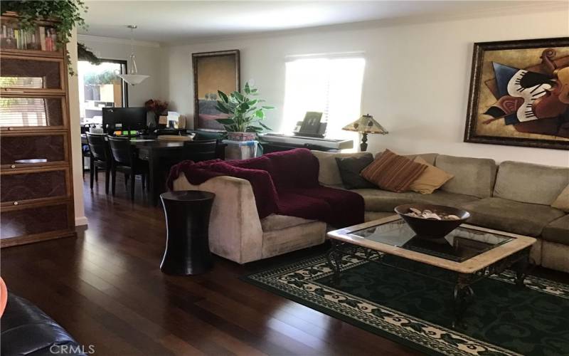 Living Room From Entrance, Doors to Enclosed Patio behind Dining Area