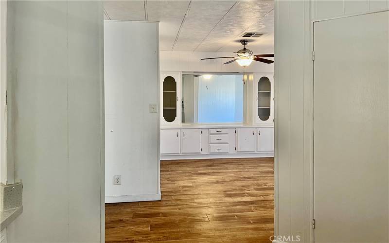 looking into front room from kitchen