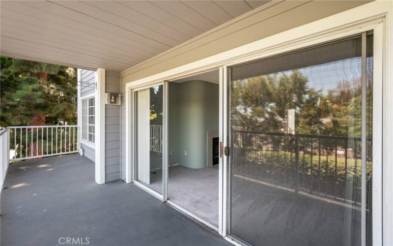 Sliding glass doors opening up to balcony