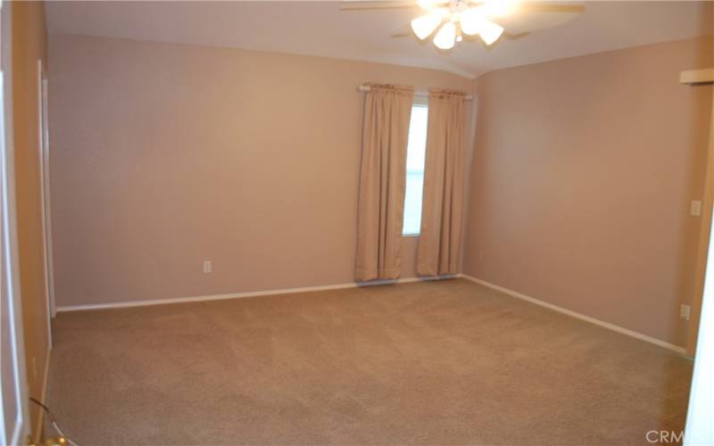 MASTER BEDROOM WITH ADJOINING BATHROOM ON LEFT