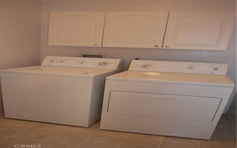 INSIDE LAUNDRY ROOM IN HALL WASHER AND DRYER INCLUDED