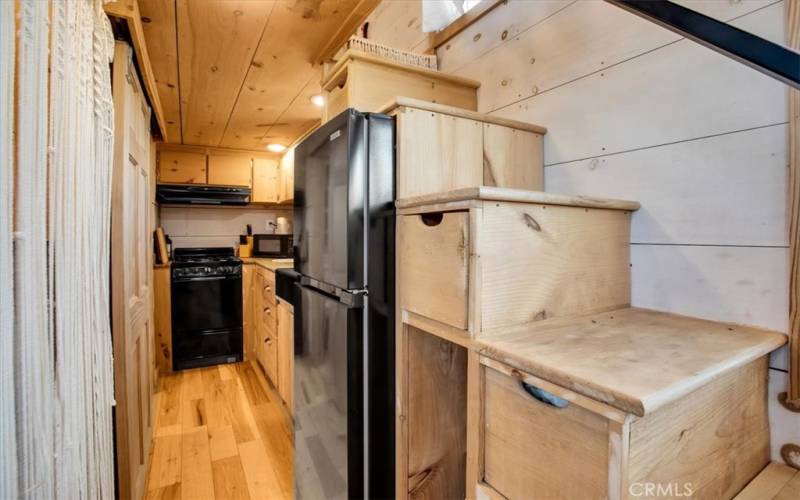 Kitchen w/ stairs to loft