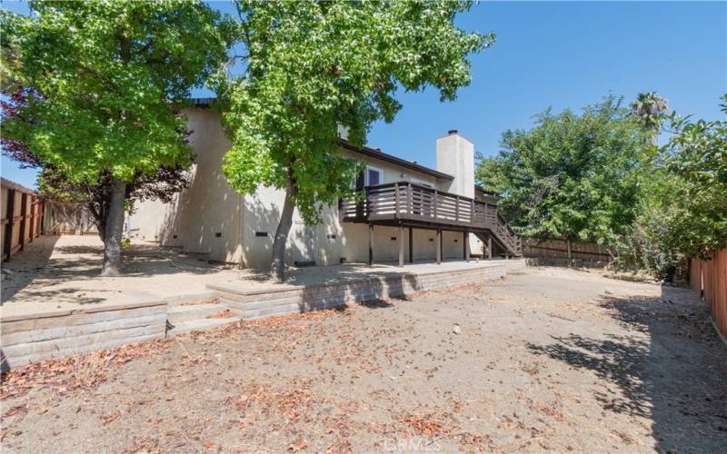 Underneath the home storage and a spacious yard area