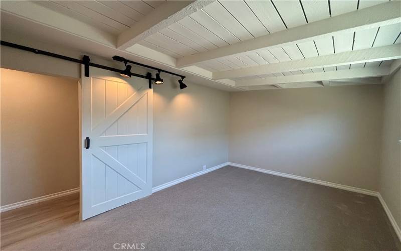 Bedroom 1 with barn door