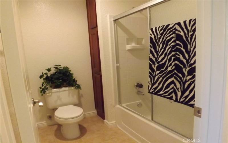 Both batrooms have tub with shower over the tub.