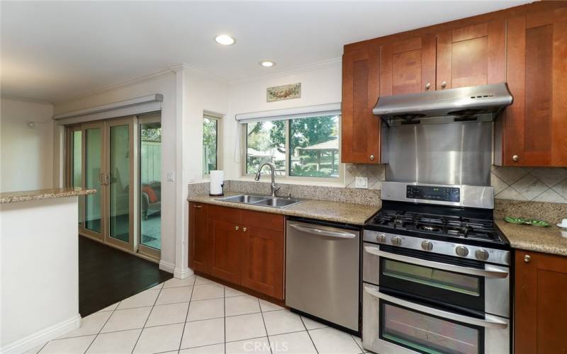 Updated kitchen w granite countertops and stainless steel appliances