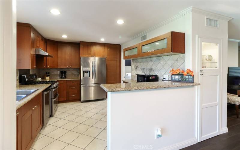 Updated kitchen w granite countertops and stainless steel appliances