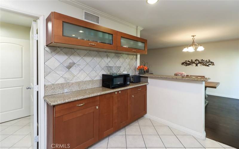 Updated kitchen w granite countertops and stainless steel appliances