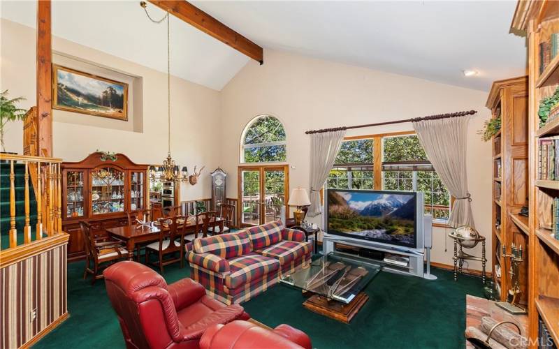 Living Room And Dining Area With Back Deck Access