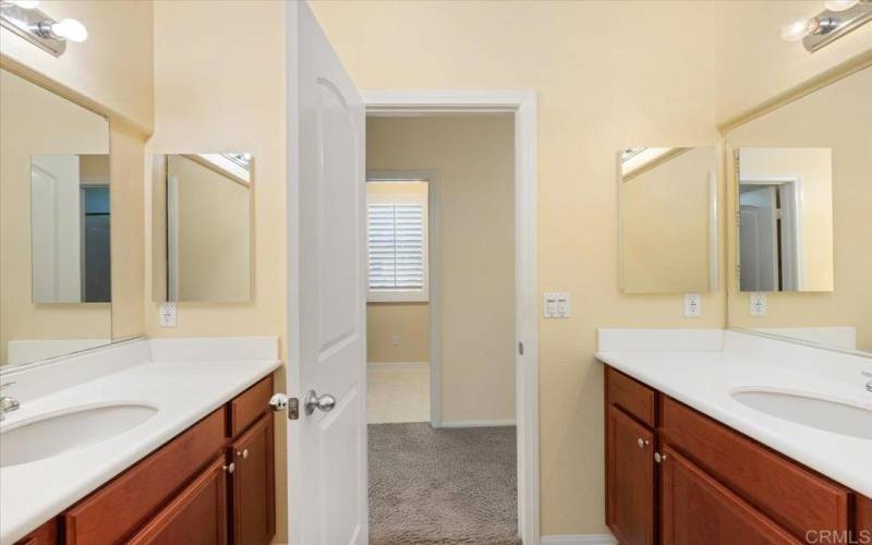 Upstairs hall bath is shared by the 2 secondary bedrooms upstairs.