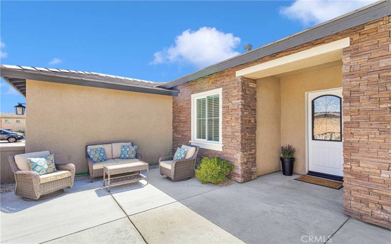 Nestled behind the courtyard wall, this space is another outdoor living area.