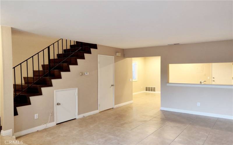 Open and Airy Living Room that Leads into the Kitchen and Dining Area