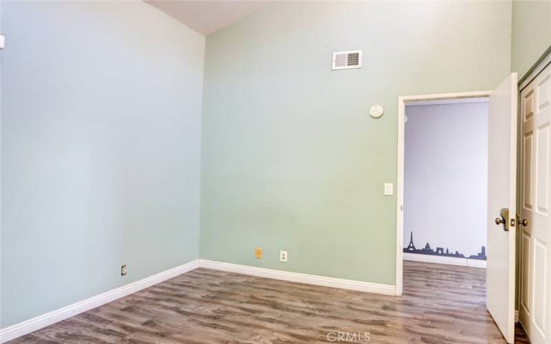 Bedroom 2 with smart door lock.