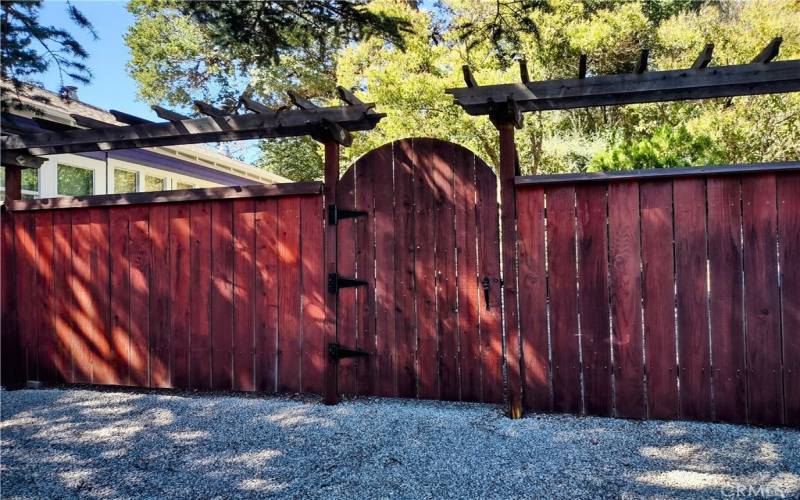 Gate and arbors to private back yard