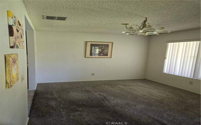 Living room view to dining area