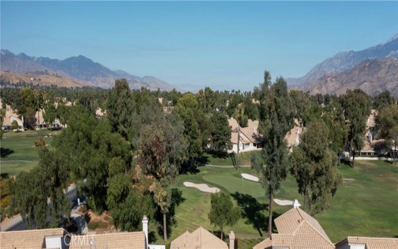 Aerial view of mountains and golf course