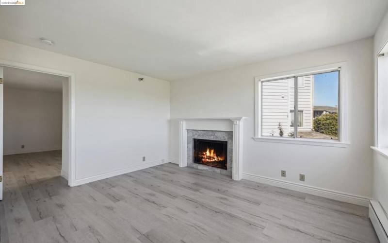 Bright living area with fireplace