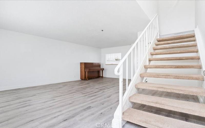 Living room and stairs to second floor