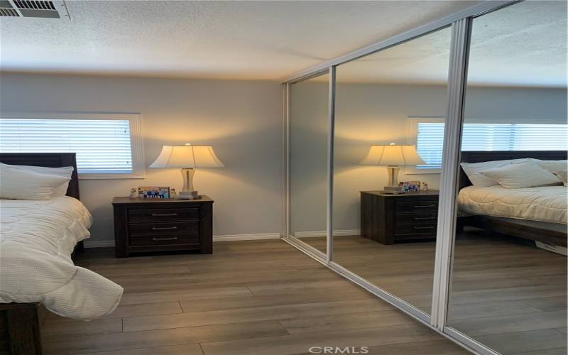 Mirrored Closet Door in the Primary Bed Room