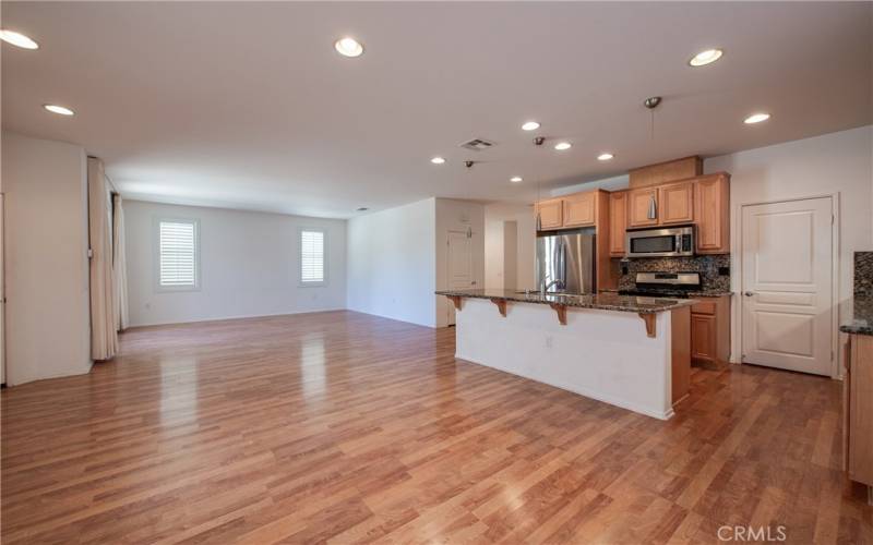 Looking from dining room to kitchen and living room.