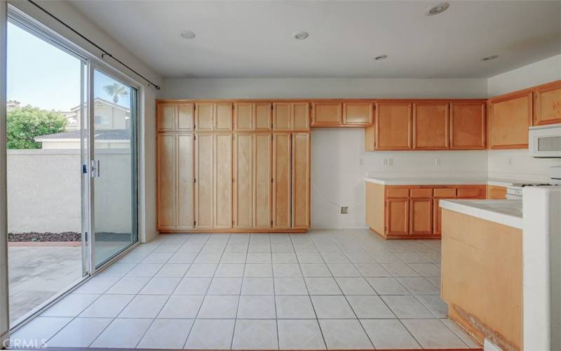 Dining nook off kitchen to patio.