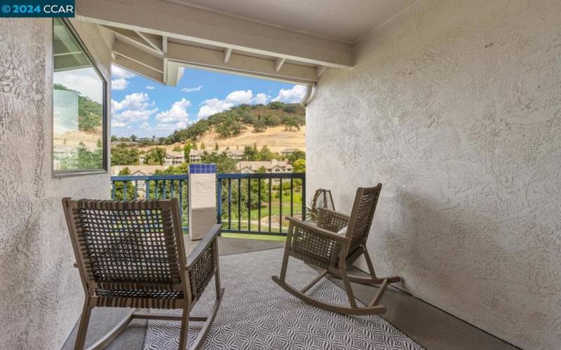 Covered Balcony with golf course views