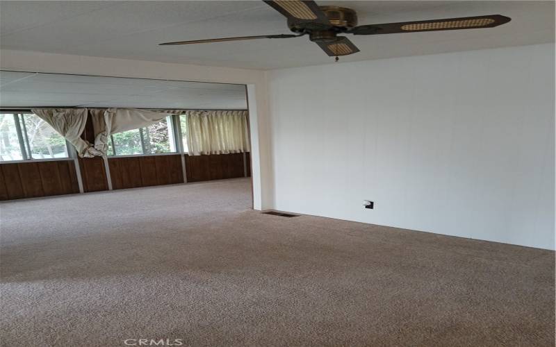 Living room looking to sun room.