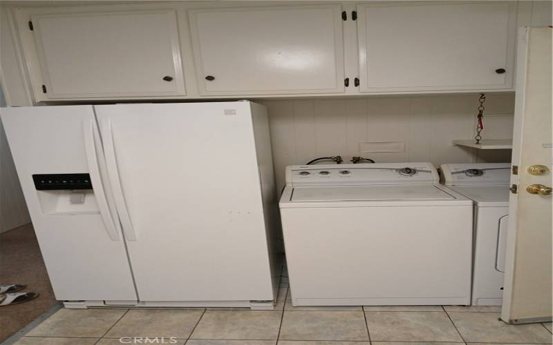 Refrigerator, washer and dryer are included.