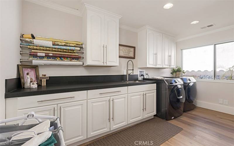 Now this is a beautiful Laundry room, you can wrap your gift right here too.