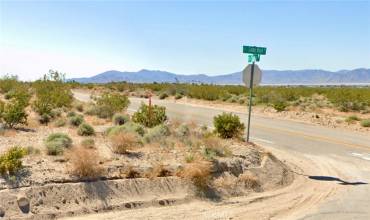 Corner of the property at the stop sign.