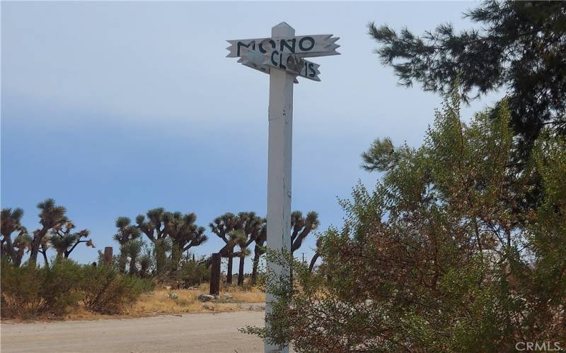 street signs on the southwest corner of Mono Rd and Clovis Rd. Lot is on the northwest corner