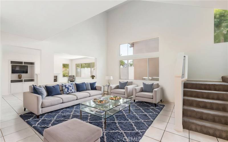 Spacious, light-filled living room with vaulted ceilings