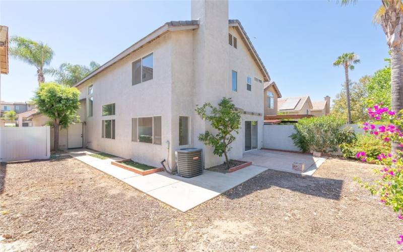 This spacious backyard offers endless possibilities for customization, whether you're dreaming of a lush garden, outdoor entertainment area, or serene retreat.